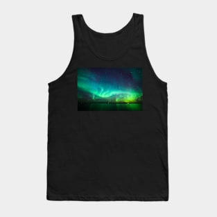 Northern lights glow over lake Tank Top